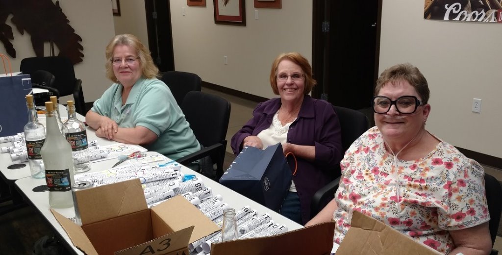 Committee hard at work!  Cheryl might have had a nip or two!!!  L-R: Cheryl Couch Tottenhoff, Anita Venneman and Lois Hasenkamp Pine